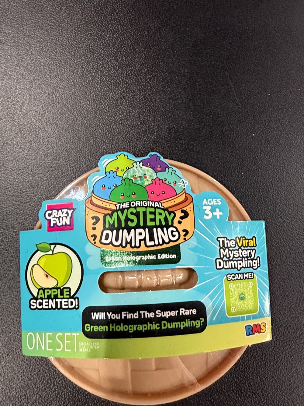 The original Mystery Dumpling green holographic edition